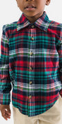 Child wearing a red, green, and blue plaid shirt on a white background