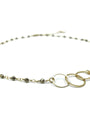 Gold necklace with interlocking rings on a white background