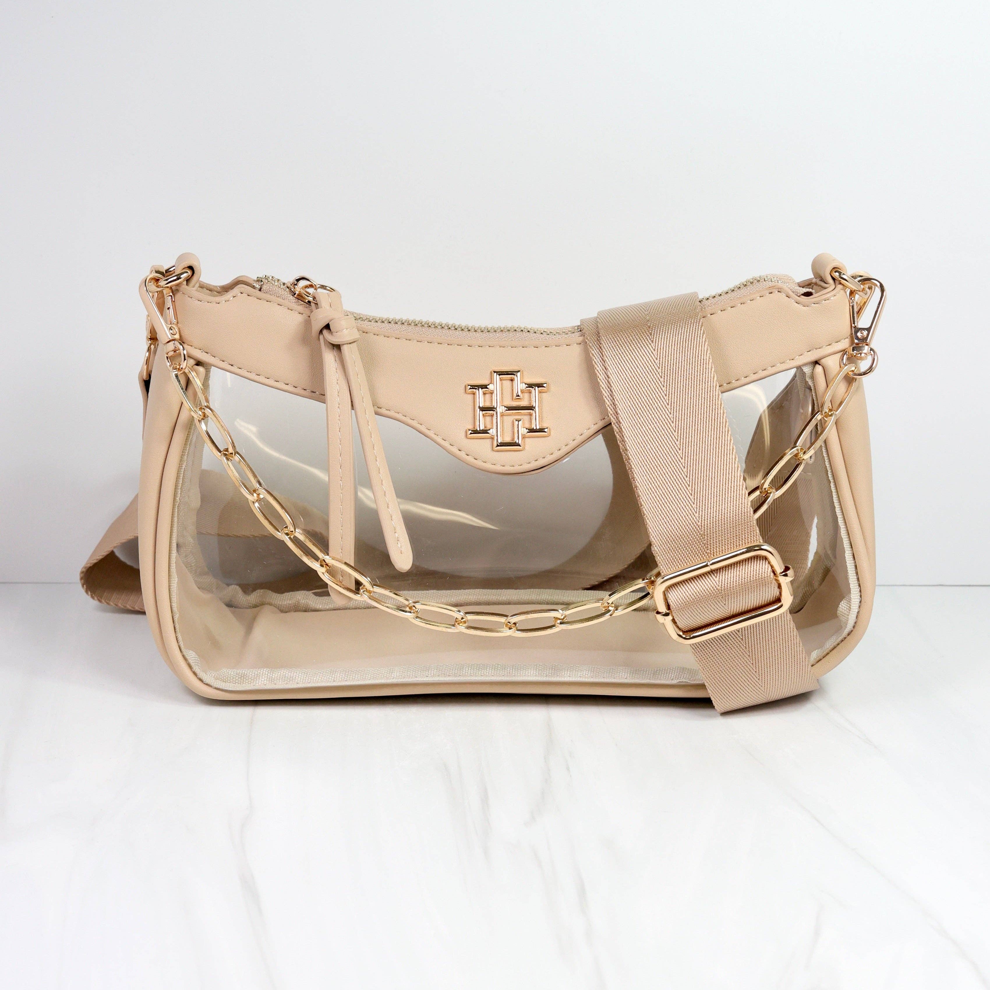 Beige handbag with clear accents on a white background