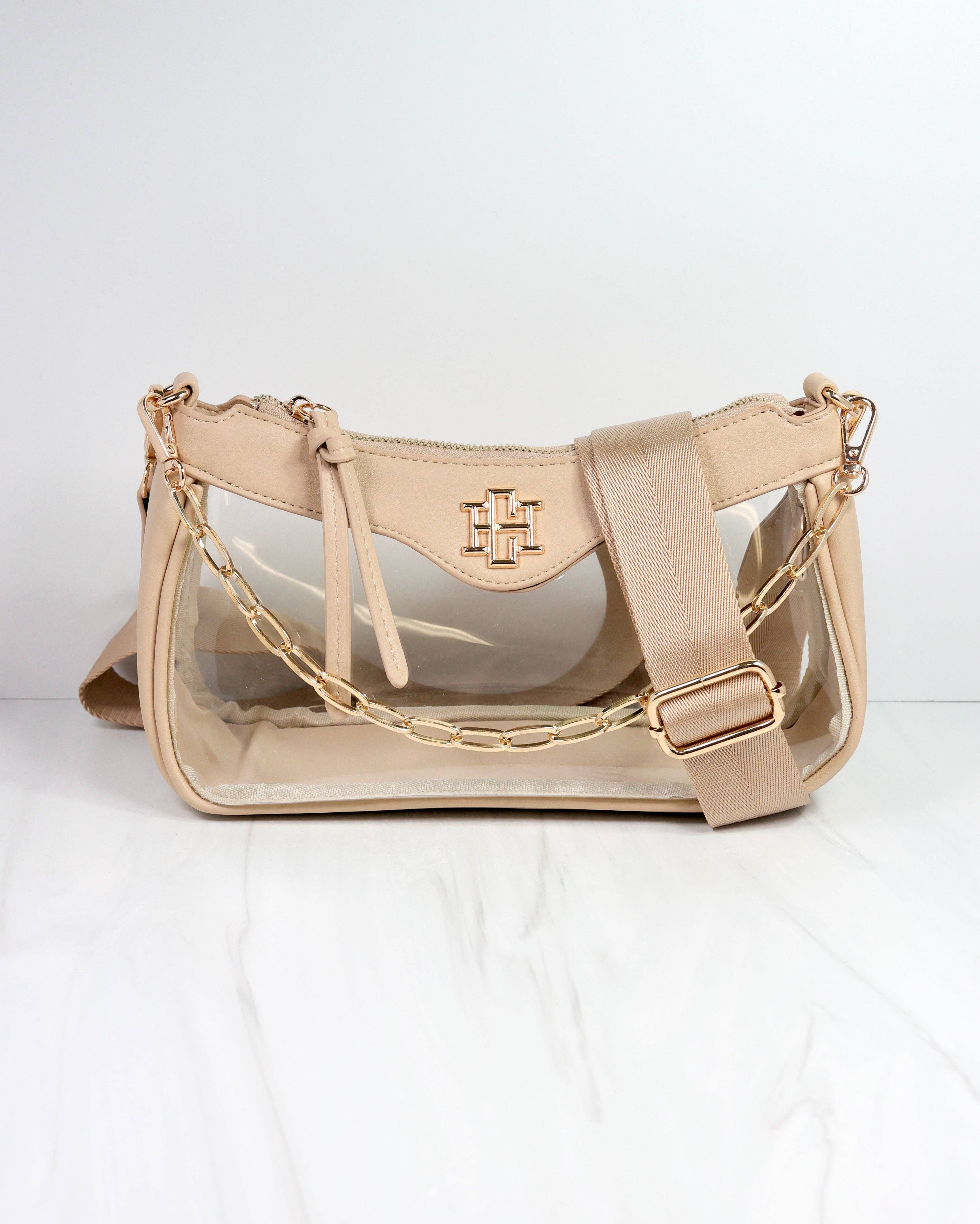 Beige handbag with clear accents on a white background