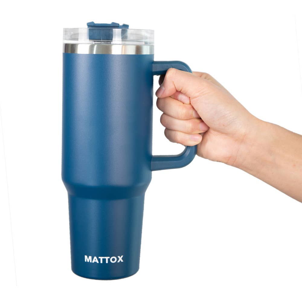Blue travel mug with handle held by a hand, brand 'MATTOX' visible