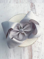 Large gray bow on a white background