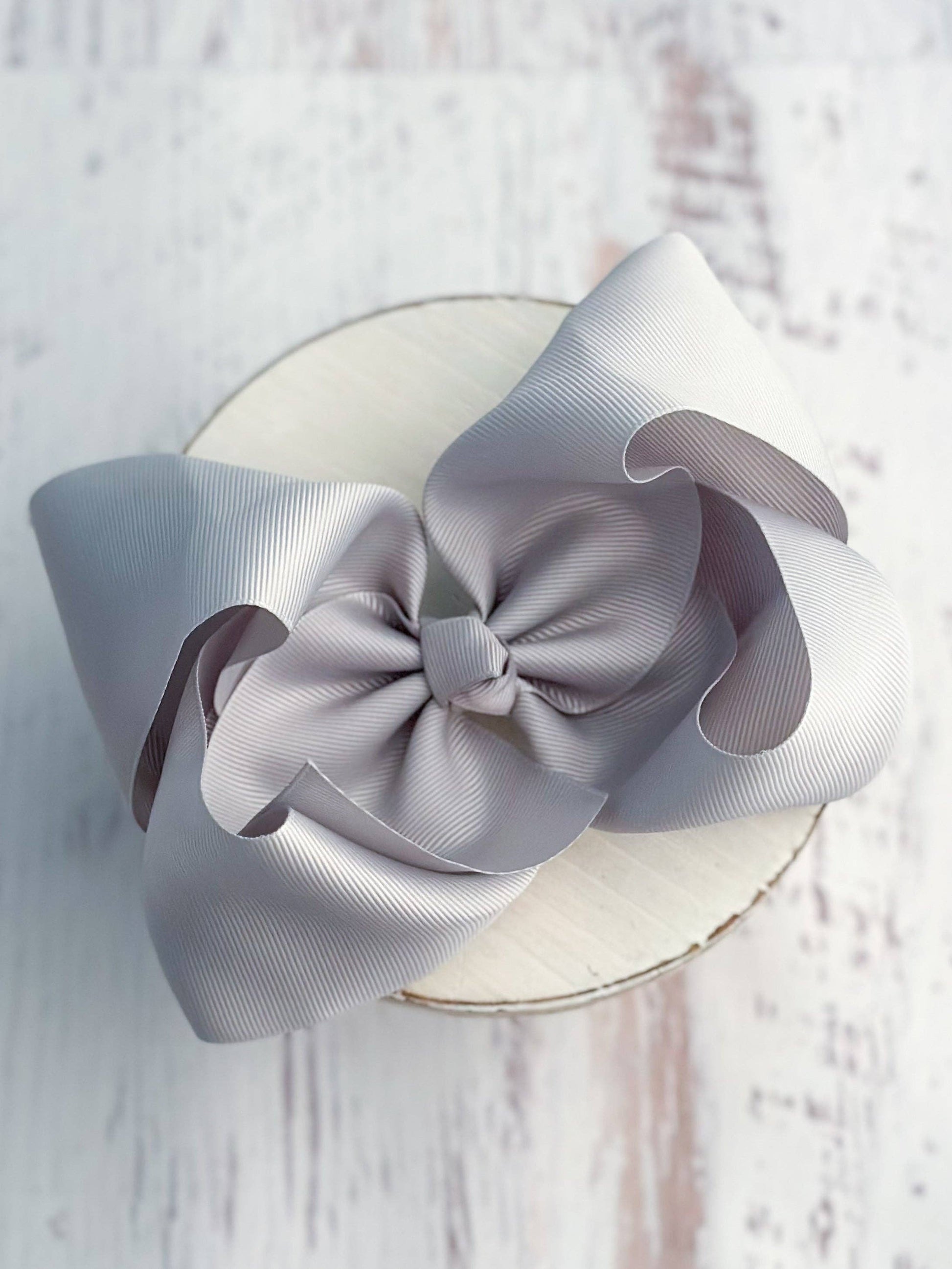 Large gray bow on a white background