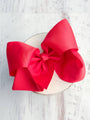 Red bow on a white background