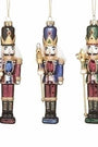 3 Nutcracker Ornaments with colorful decor on a white background
