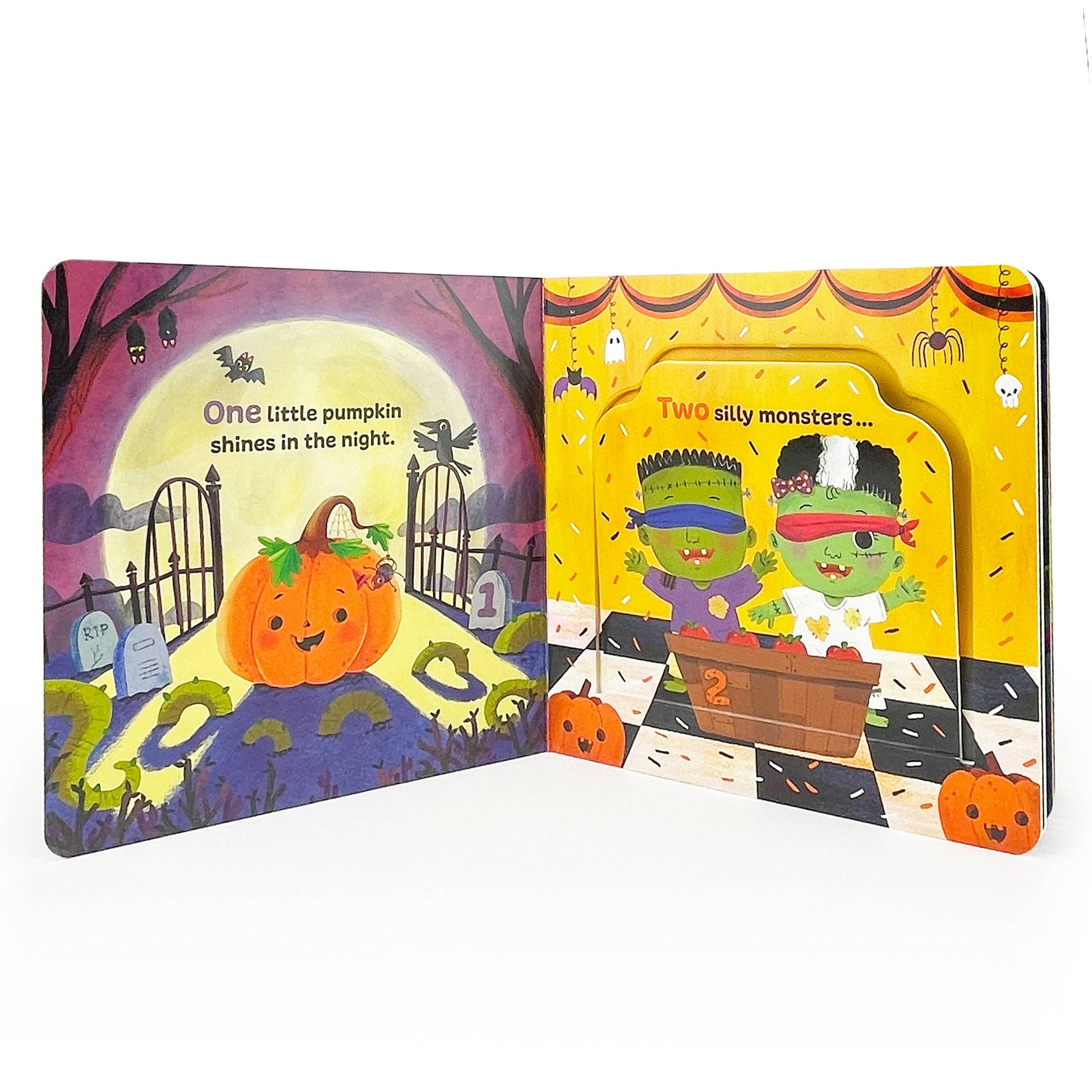 Open children's book showing Halloween-themed pages with pumpkins and monsters.