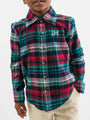 Child wearing a red, green, and blue plaid shirt with a logo on a white background