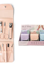 Manicure set with tools and packaging on a white background