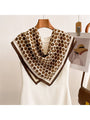 Coffee brown dot square scarf wrap with dark edge, draped around neckline