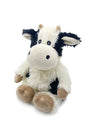 Plush cow toy with black patches and brown details on a white background