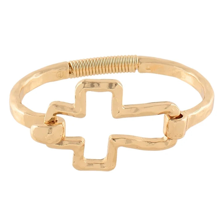 A gold-plated open cuff bracelet featuring a central open cross design and a textured spring ring clasp, shown on a plain white background.