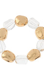 Bracelet with gold and clear beads on a white background