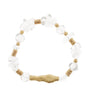 A beaded stretch bracelet featuring clear faceted crystal beads, small tan wooden beads, and a textured gold-toned central charm, displayed on a solid white background.