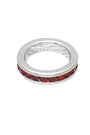 Silver ring with red gemstones on a white background