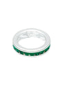 Silver ring with green gemstones on a white background