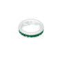 Silver ring with green gemstones on a white background