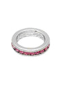 Silver ring with pink gemstones on a white background