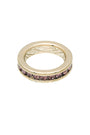 Gold ring with pink gemstones on a white background