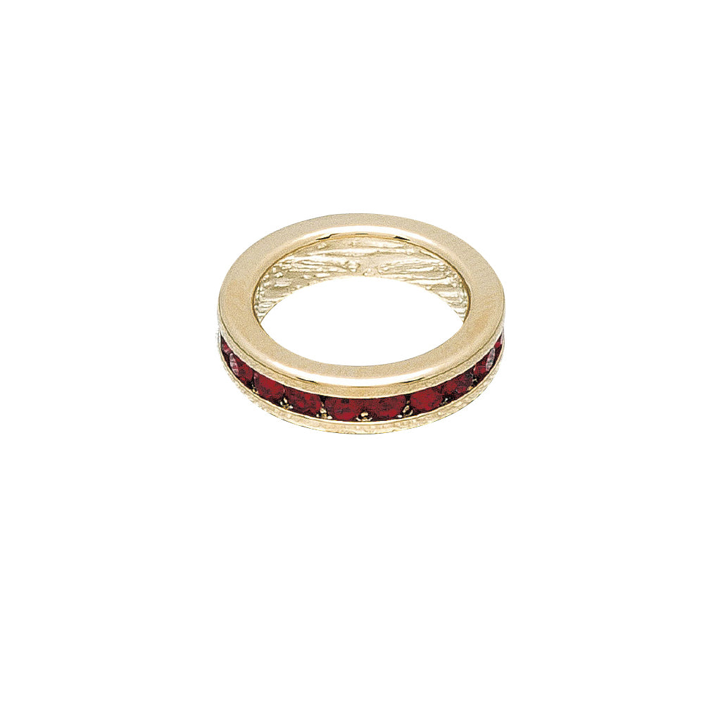 Gold ring with red gemstones on a white background