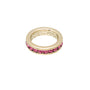 Gold ring with pink gemstones on a white background