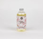 Bottle of 'Sweet Grace' flower diffuser refill on a white background