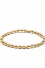 Gold beaded bracelet on a white background