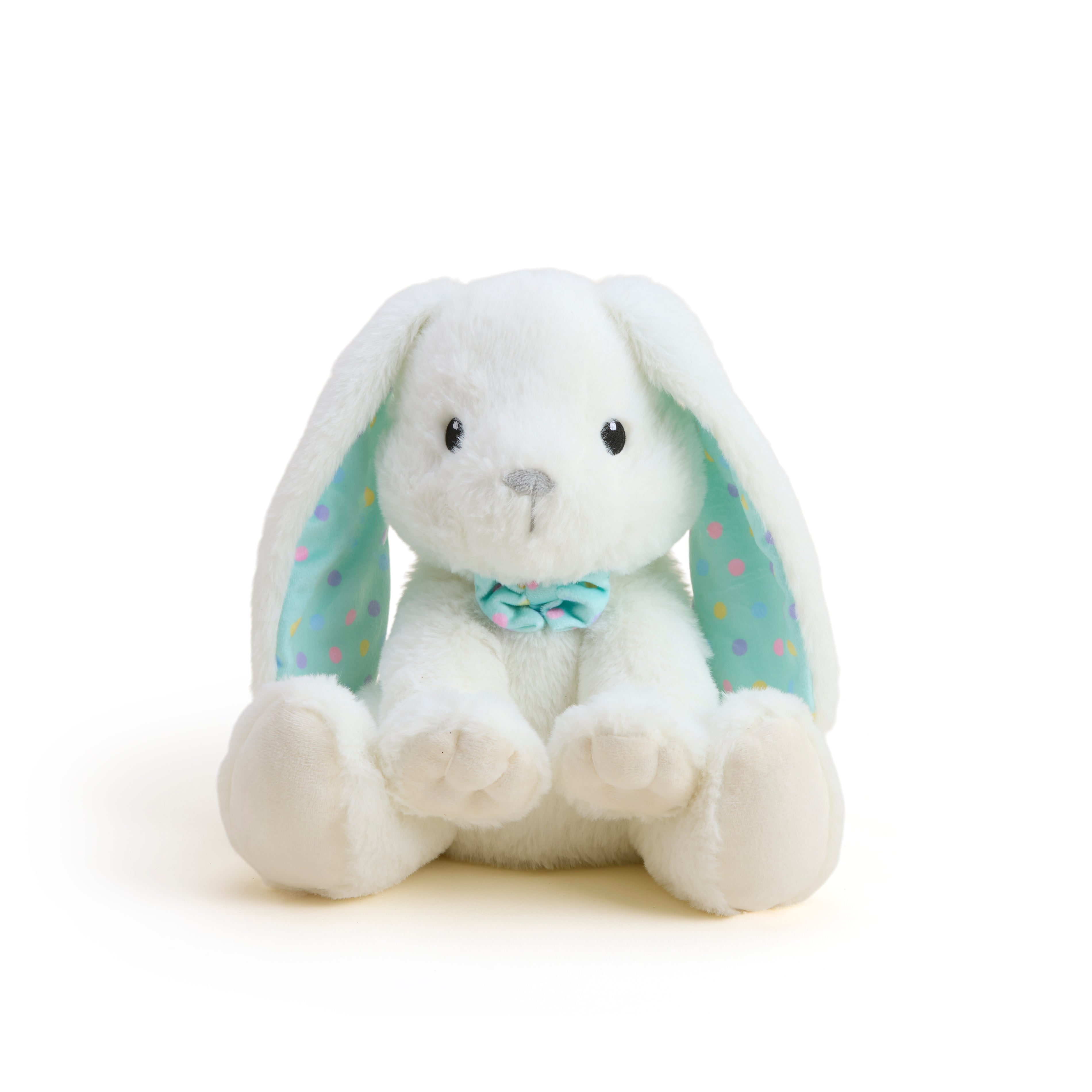 White plush bunny with colorful ears and a bow tie on a white background