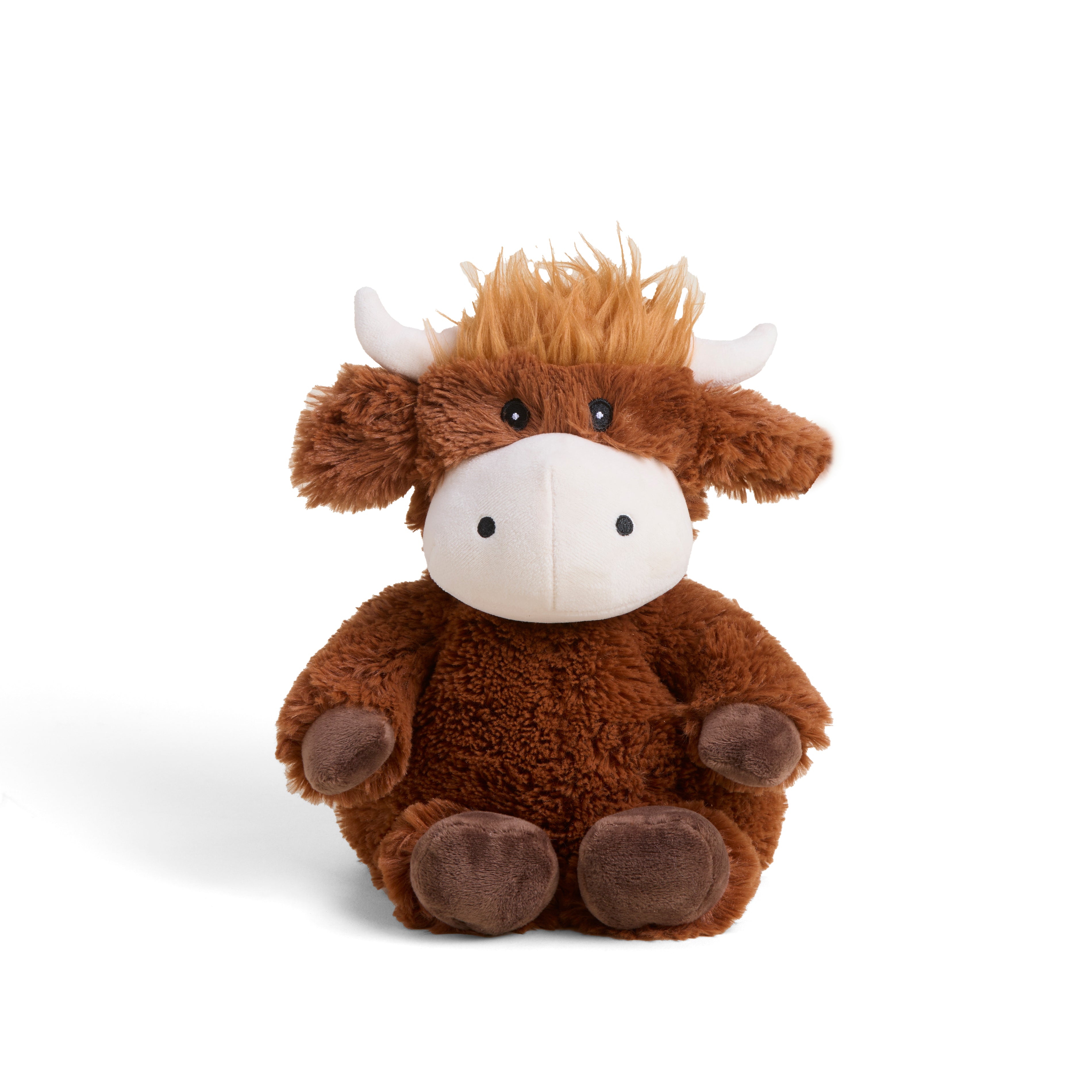 Plush toy cow with brown fur and white face on a white background