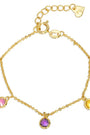 Gold bracelet with colorful gemstones on a white background