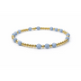 Bracelet with blue beads and gold accents on a white background