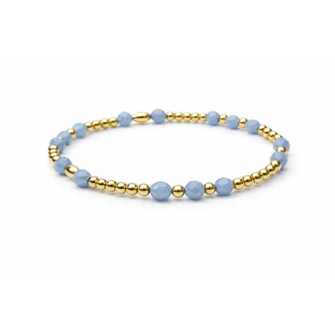 Bracelet with blue beads and gold accents on a white background