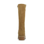 Tan knee-high boot on a white background