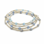 Set of beaded bracelets with blue, gray, and gold beads on a white background