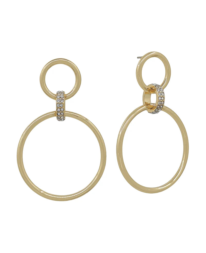 A pair of gold drop earrings featuring a small top ring, a vertical band of clear rhinestones, and a larger oval drop ring below, shown on a plain white background.