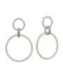 A pair of silver-tone drop earrings featuring a small circular hoop connected to a larger oval drop, with a small pavé-set accent between the hoops, shown on a plain white background.