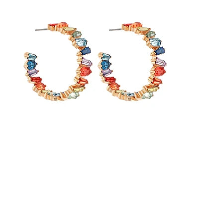 Multicolored hoop earrings on a white background