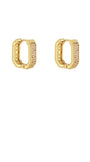 A pair of gold huggie hoop earrings with pavé-set clear stones on the front, shown against a plain white background.