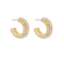 Gold hoop earrings with pearl-like beads on a white background