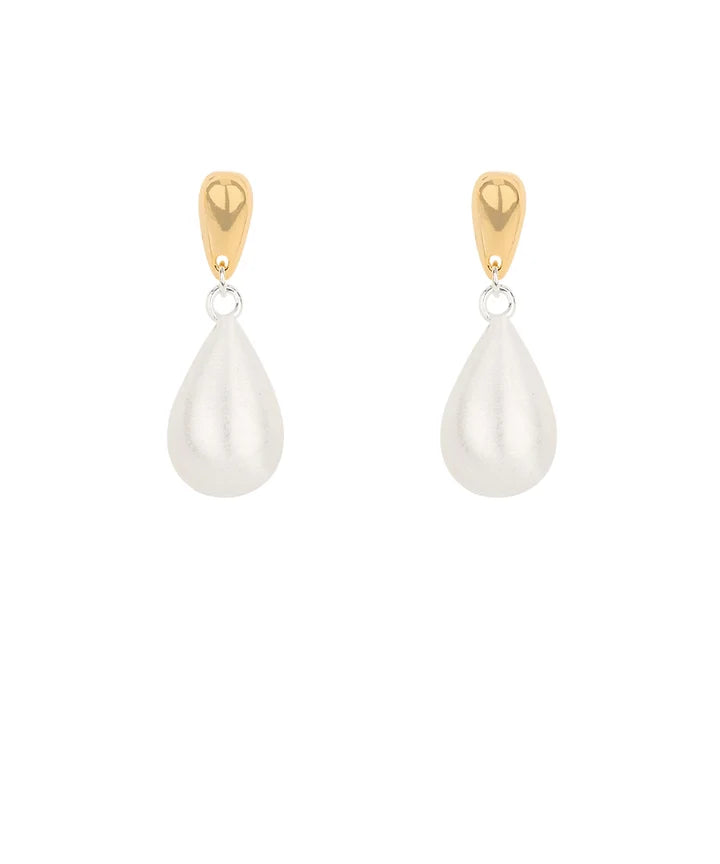 A pair of gold and white teardrop dangle earrings on a solid white background.
