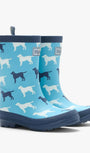 Blue children's wellington boots with dog pattern on a white background