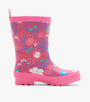 Pink children's rain boot with floral pattern on a white background