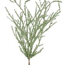 Artificial greenery branch on a white background