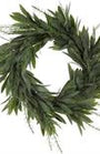 Artificial green wreath with leaves on a white background