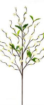 Artificial plant branch with green leaves on a white background