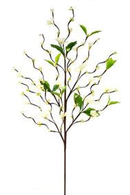 Artificial plant branch with green leaves on a white background