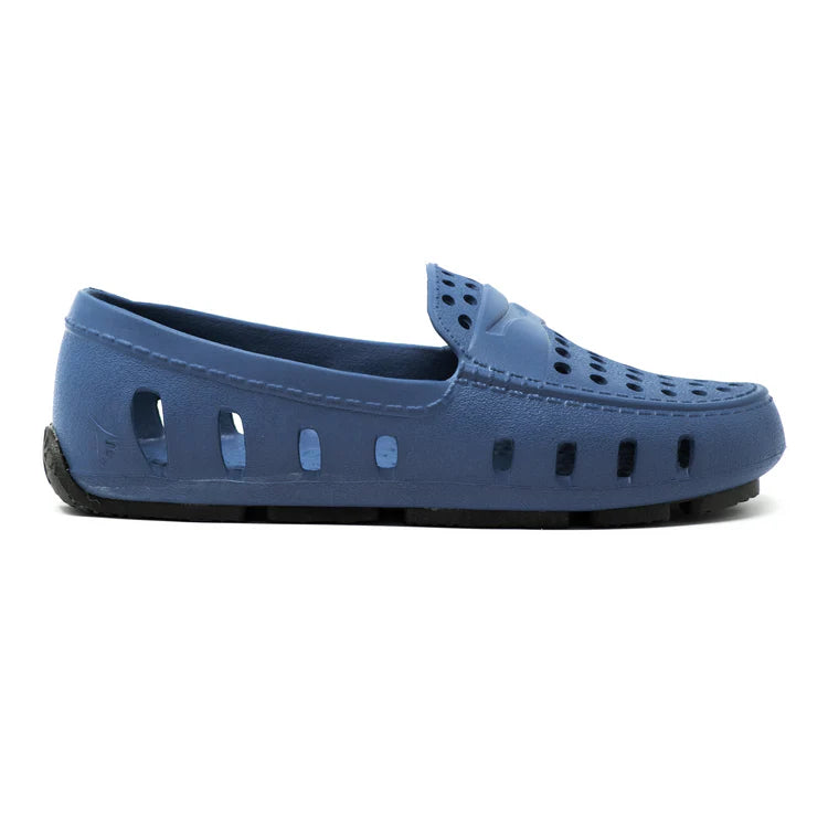 Blue loafer shoe on a white background