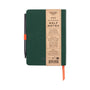 Green notebook with a pen attached on a white background