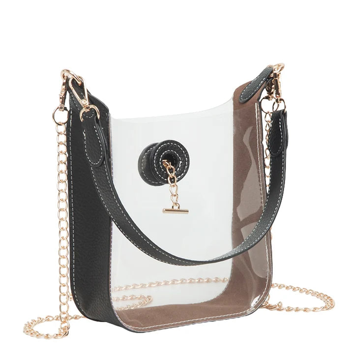 Black and clear handbag with gold chain strap on a white background