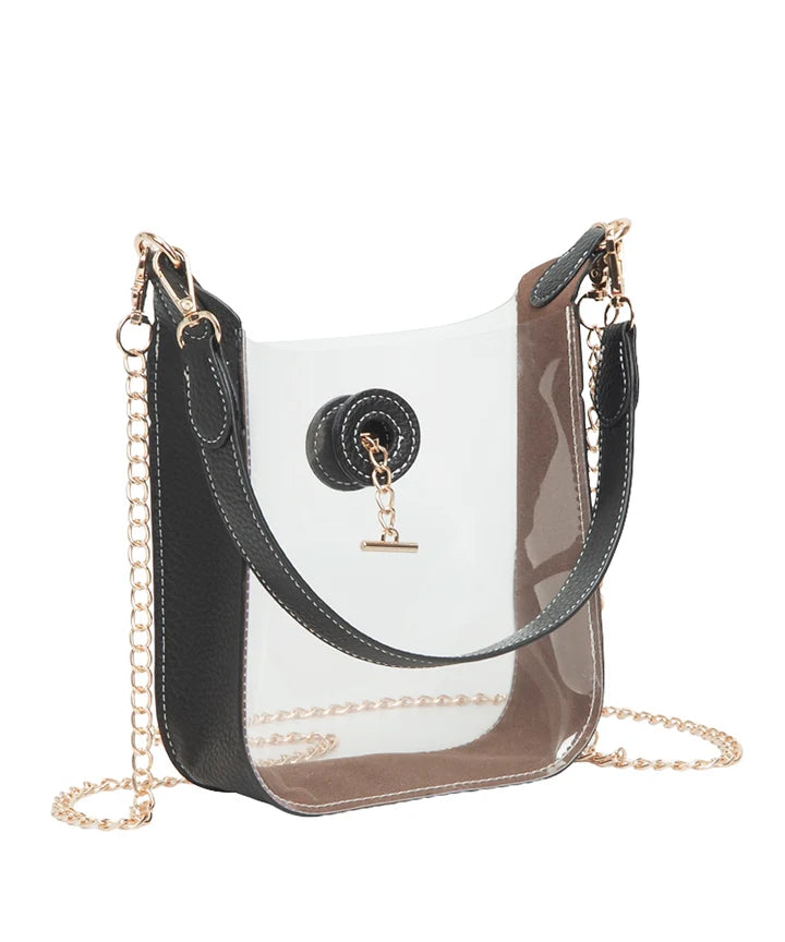 Black and clear handbag with gold chain strap on a white background