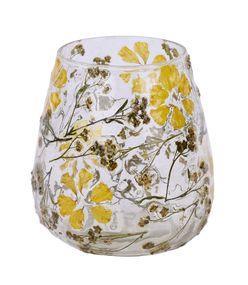 Stemless glass candle holder with floral design on a white background